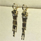 C Cheetah Earrings - showing the charm of courage, naughty or docile .18K gold, lacquer, diamond, shafle garnet, Onyx